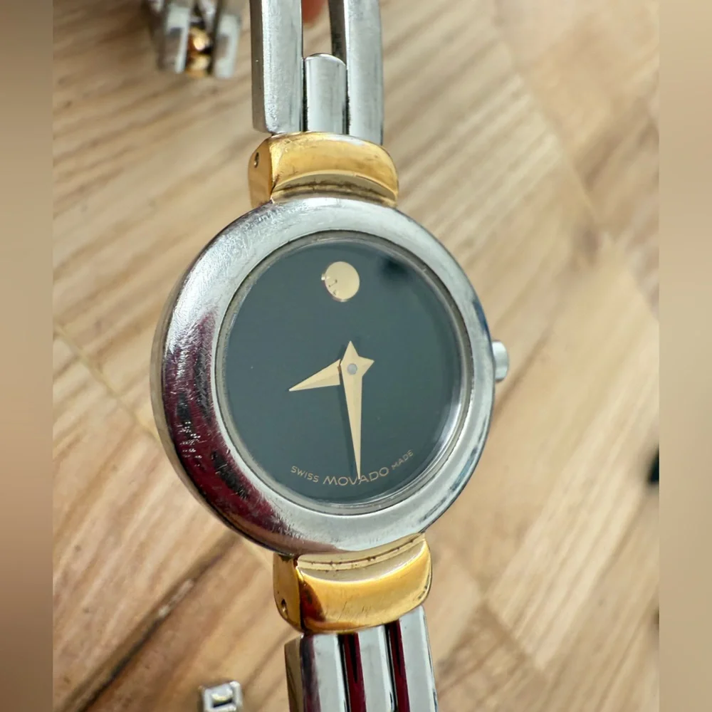 Movado ladies black dial two toned minimalist watch NEW BATTERY